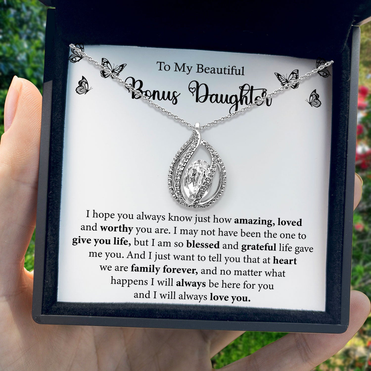 To My Beautiful Bonus Daughter - At Heart We Are Family Forever - Orbital Birdcage Necklace
